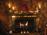 fireplace mantle decorated with candles