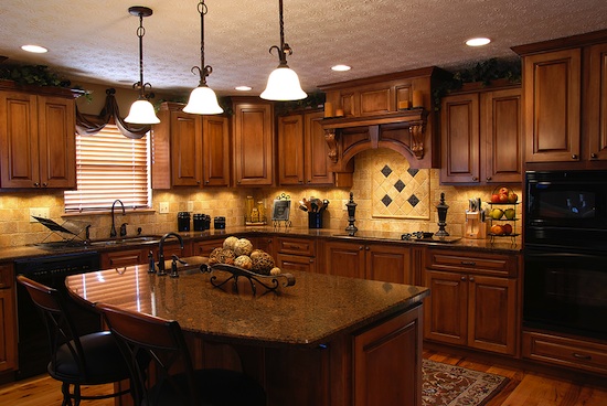 traditional kitchen with granite counters and backsplash